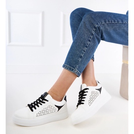 White sneakers with black inserts on the platform 2