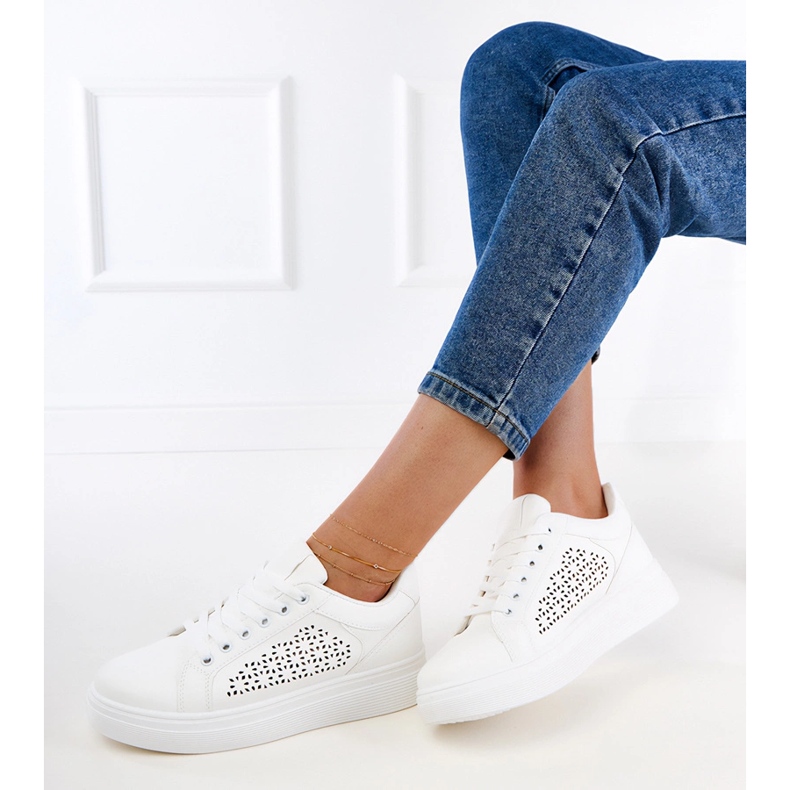 White sneakers on the platform 2