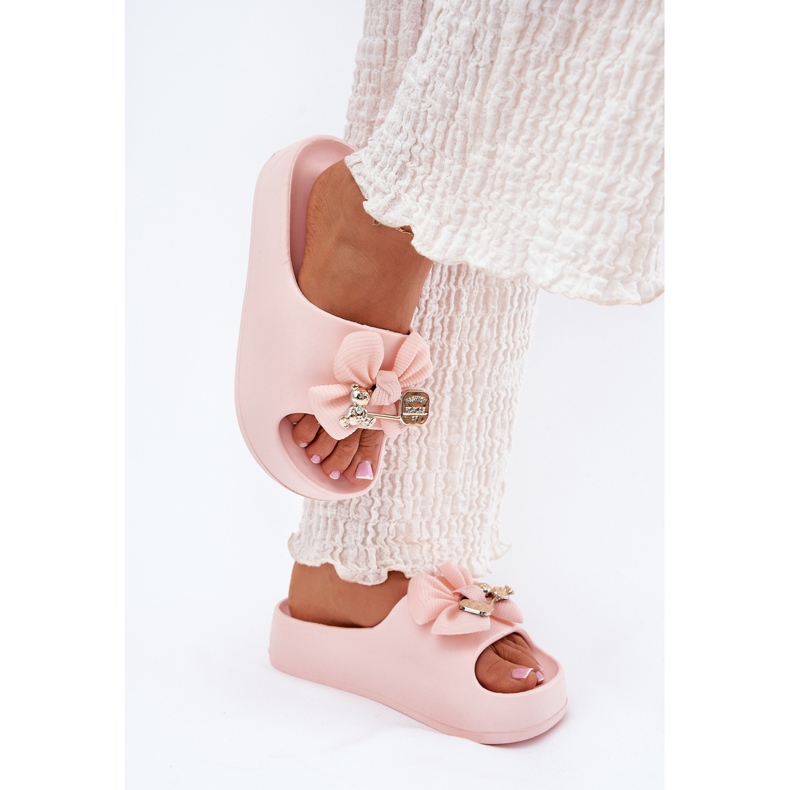 Women's foam slippers on the platform with a bow and a pink brooch 2