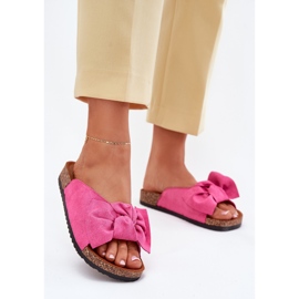 Women's flip flops on a cork sole with a bow of fuchsia pink 2