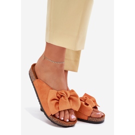 Women's flip flops on the cork sole with an orange bow 1