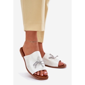 EVento Flat -heeled women's flip flops with a decorative silver binding 1