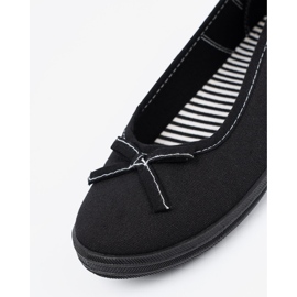 Black material ballerinas with a bow 1