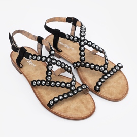Black sandals decorated with studs 2