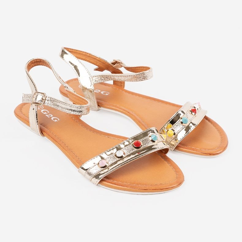 Golden flat sandals with colorful studs 1