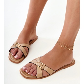 Brown flip -flops with a decorative buckle on the belt 1