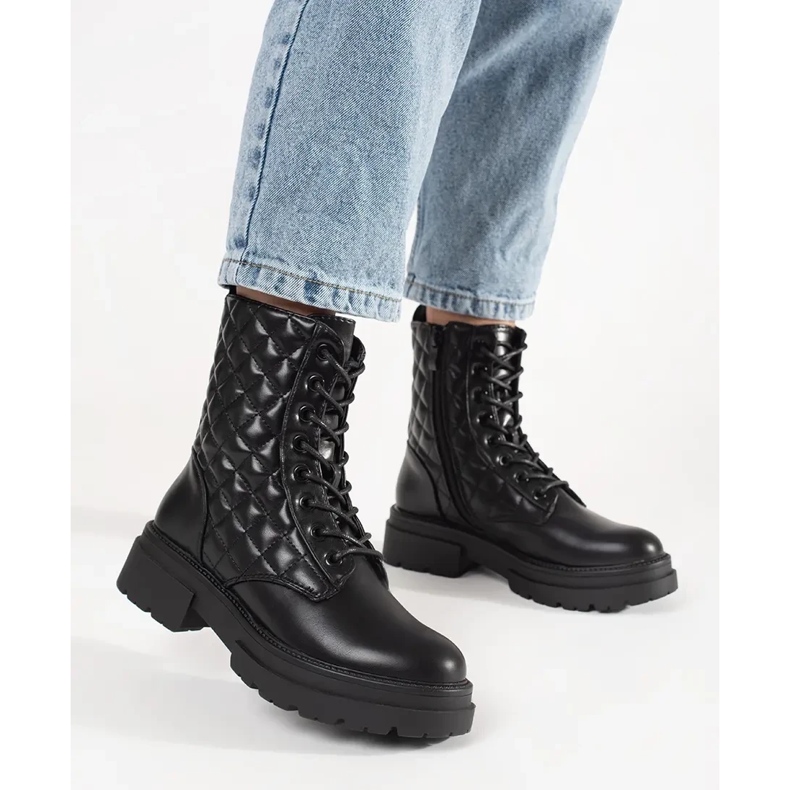 Black quilted workers on the platform 2