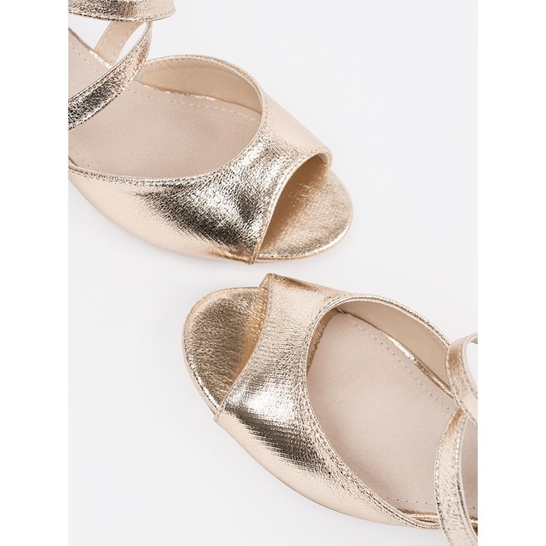 Goodin Gold sandals on a low post golden 1