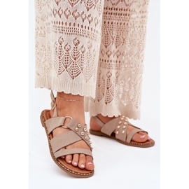 Flat -heeled women's sandals with golden studs beige 2