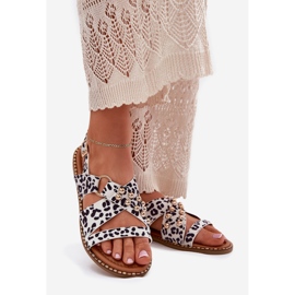 Flat-heeled women's sandals with golden-white studs 1