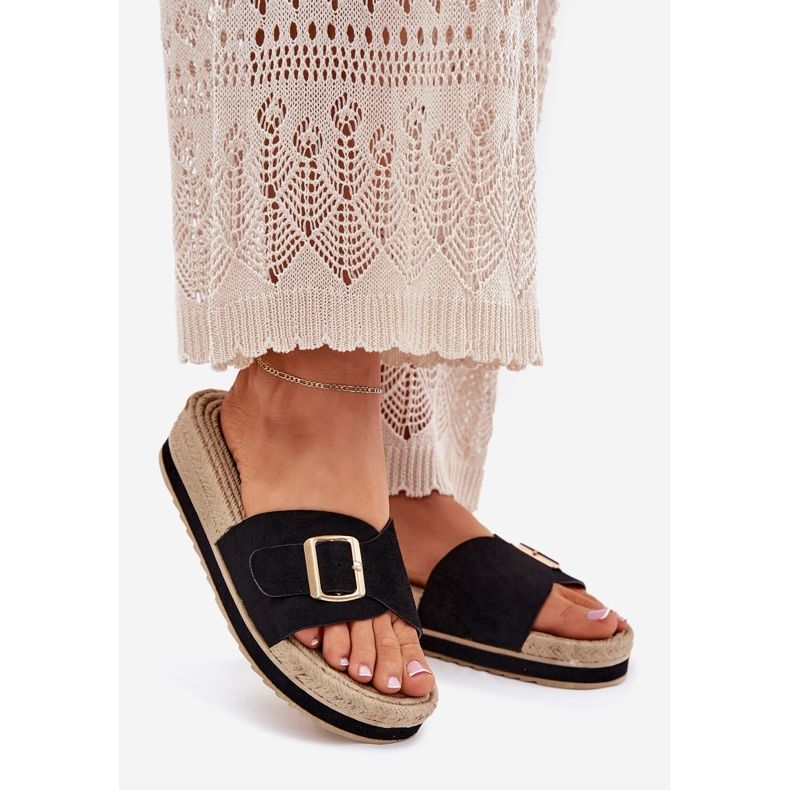 Women's flip flops on the platform with a golden clamp black 1