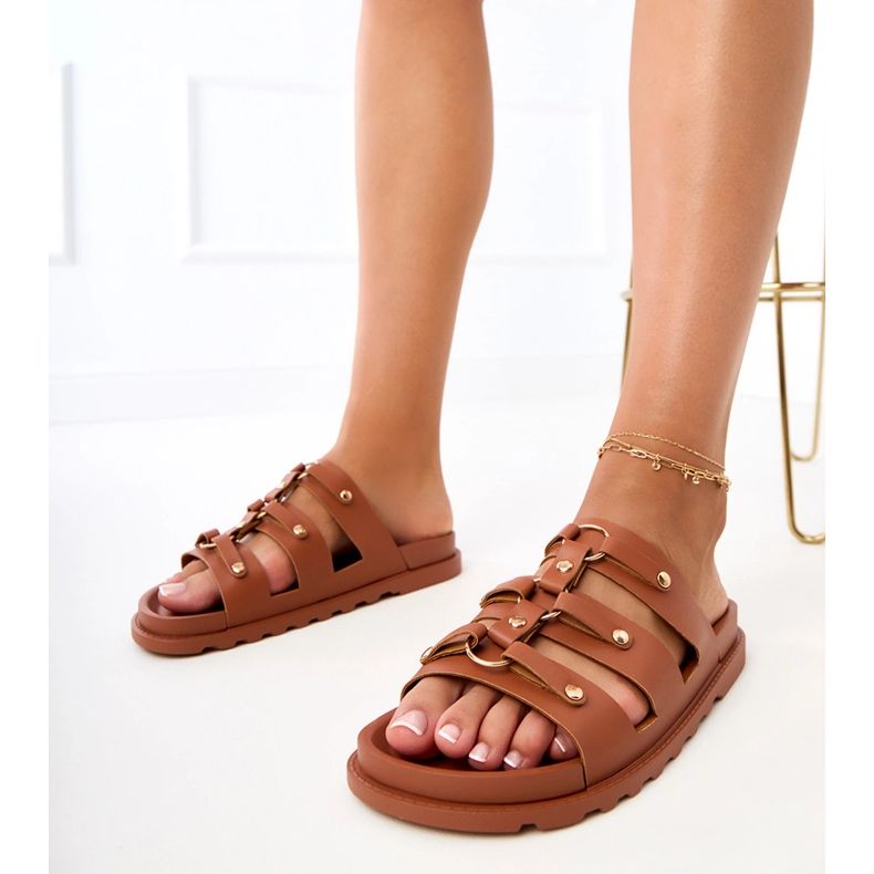 Brown Roman flip -flops with studs 1