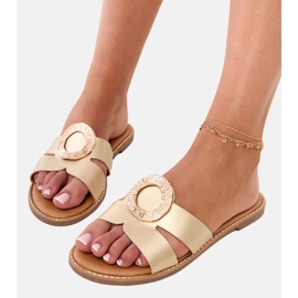 Golden flip flops with a golden ornament and cutouts on the belt 2