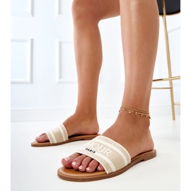 Beige flip flops with an embroidered strap 1
