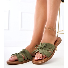 Green flip flops with a bow and decoration at the edges 1