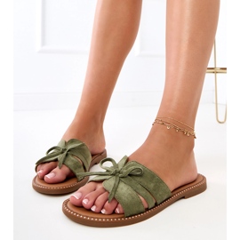 Green flip flops with a bow and decoration at the edges 2