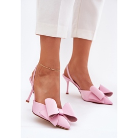 High heels with bare heels and a pink bow 2