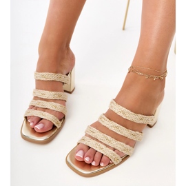 Golden flip -flops on the post with braided stripes 1 Golden flip -flops on the post with braided stripes 1