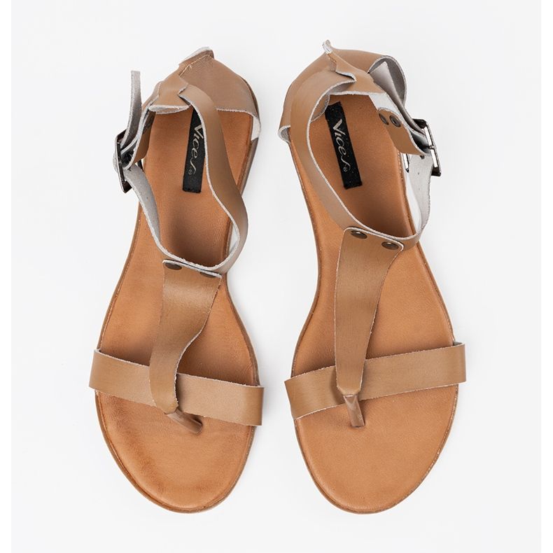 Brown leather sandals in the style of Japanese 1