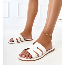 White flip -flops decorated with cutouts 1