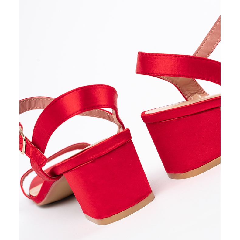 Shelvt Red sandals on a post 1