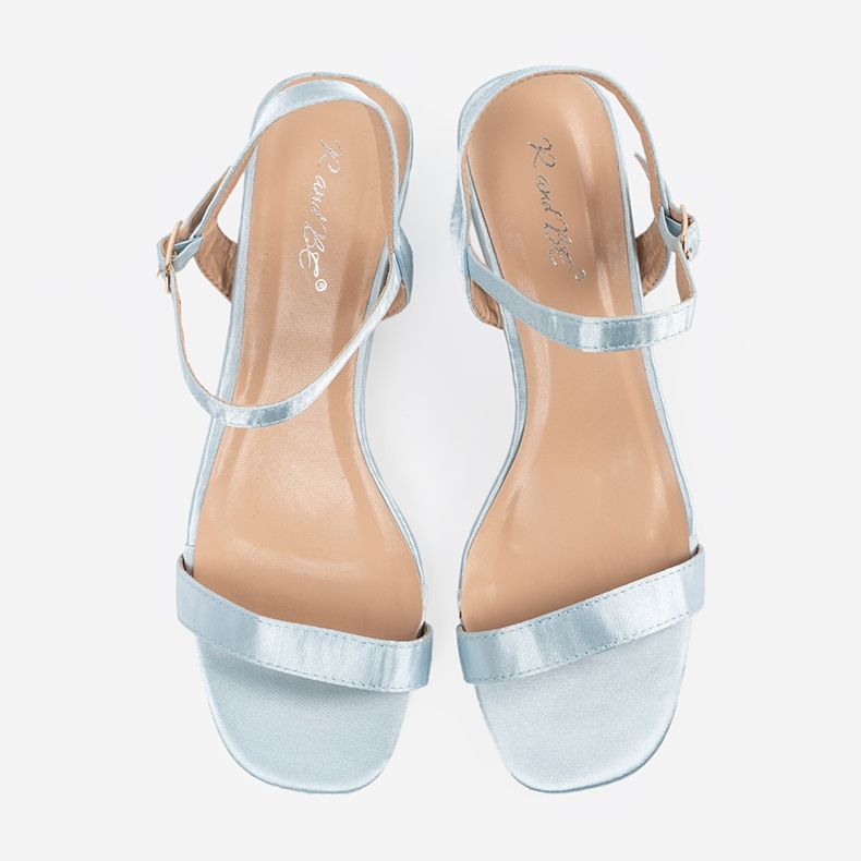 Blue sandals on a post 1