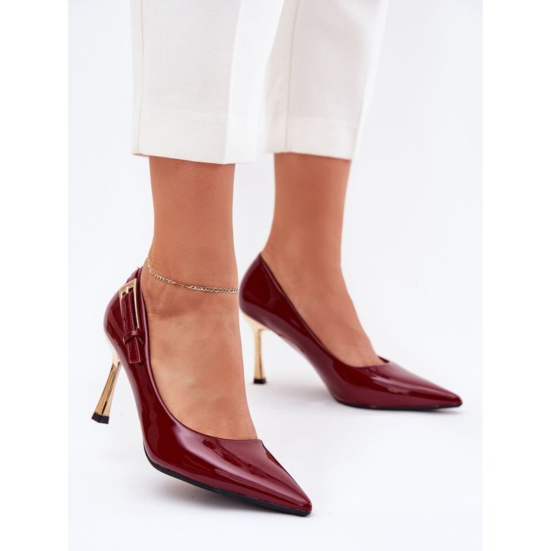 Varnished heels with a golden burgundy clamp red 2 Varnished heels with a golden burgundy clamp red 2
