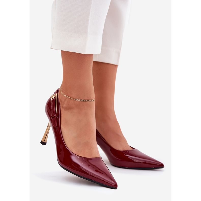 Varnished heels with a golden burgundy clamp red 1 Varnished heels with a golden burgundy clamp red 1