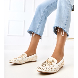 White loafers decorated with LEA studs 1