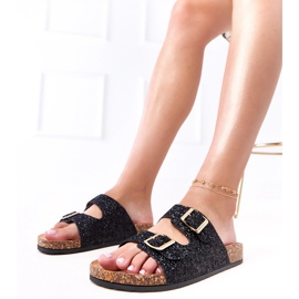 Black glitter flip flops on the cork sole of the fleet 1 Black glitter flip flops on the cork sole of the fleet 1