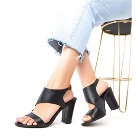 Black sandals on the post fastened with Sergida cubes 2 Black sandals on the post fastened with Sergida cubes 2