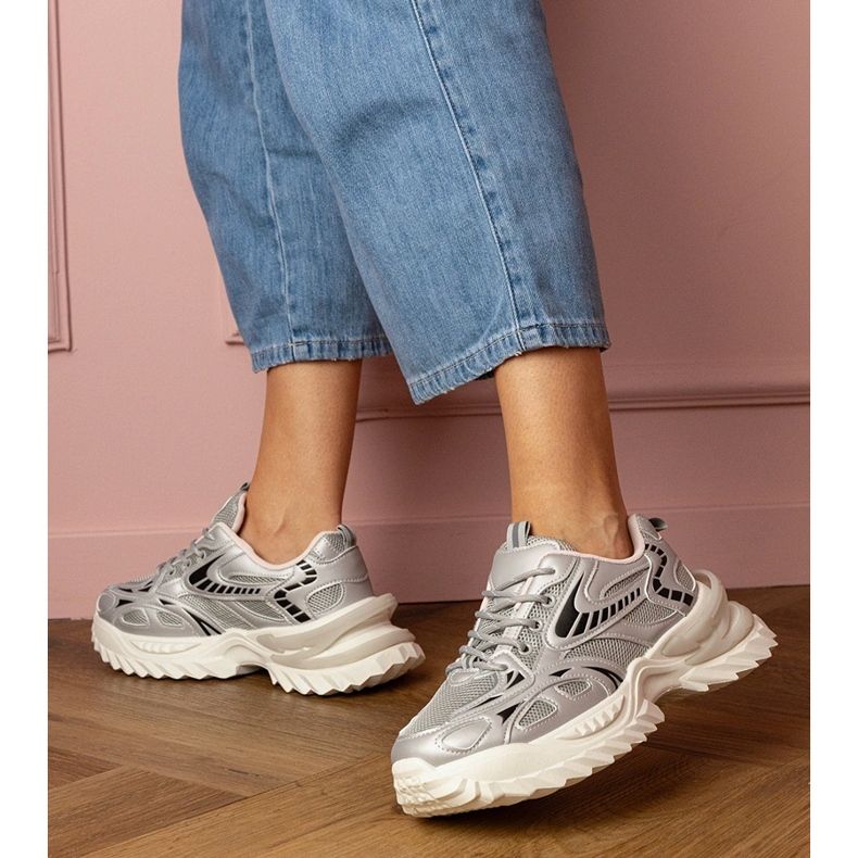 Silver sports sneakers on a stylish sole 2 Silver sports sneakers on a stylish sole 2