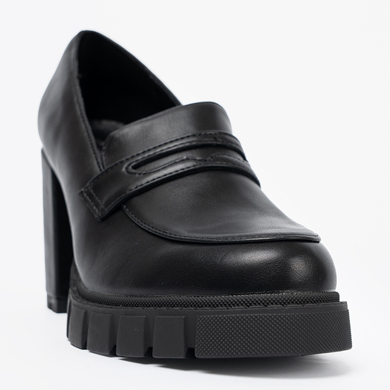 Shelvt Black Loays on a post with a trapper sole 1