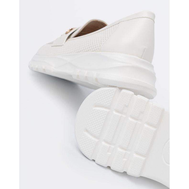 Shelvt White loafers with a decorative golden element. 2