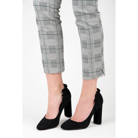 Seastar Pumps on a post with a frill black 1