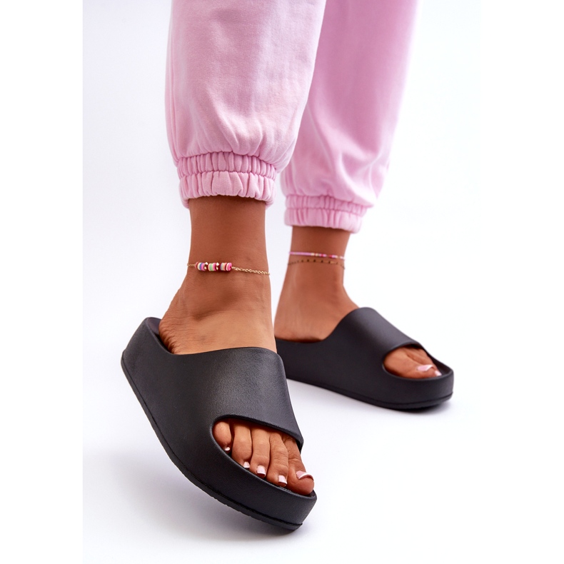 Women's flip flops on the platform black foam 1