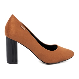 Goodin Light brown pumps on a black post 2