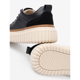 Black leather sneakers on the Sergio Leone beige platform 1