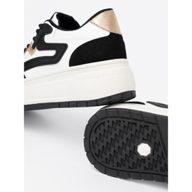 Shelvt Black and white sneakers with golden details 1