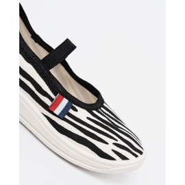 Shelvt Black and white light sneakers inserted with a zebra motif 1