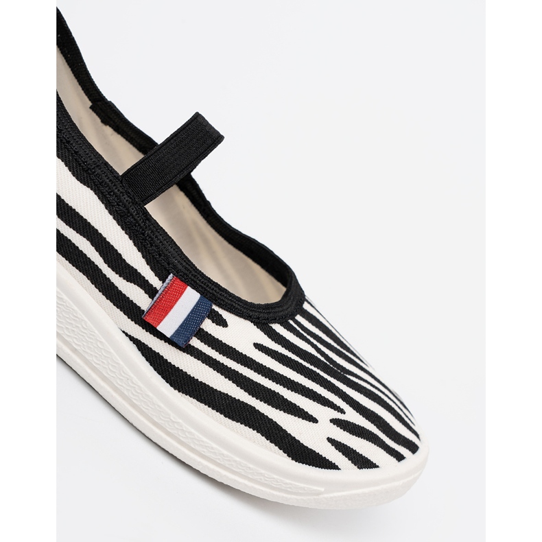 Shelvt Black and white light sneakers inserted with a zebra motif 1