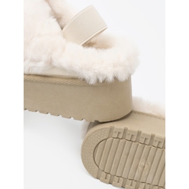 Shelvt Golden shoes and snow boots with white fur 1