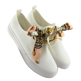 Sneakers laced with a white ribbon 2