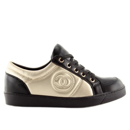 Chanelki sneakers Y612 Black black and gold 1