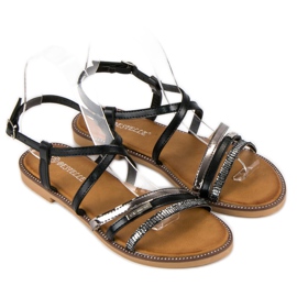 Bestelle Black sandals fastened with a buckle 1