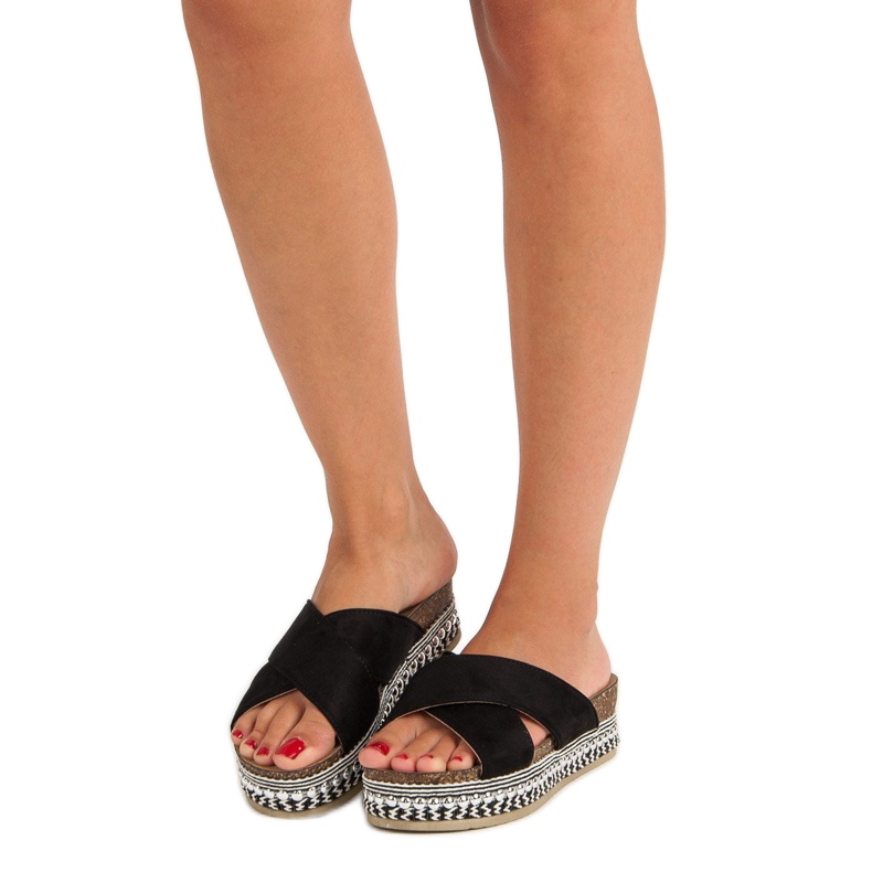 Black slippers on the platform 1