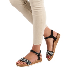 Ch. Creation Black flat sandals 1
