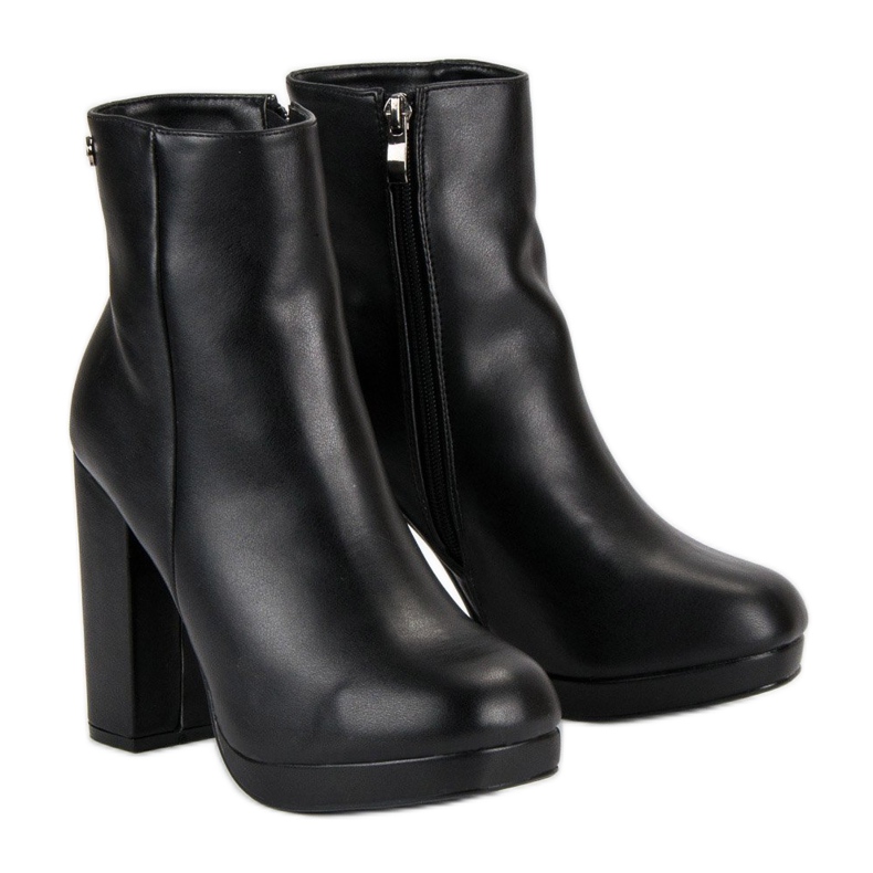 Small Swan Classic boots on the post black 1