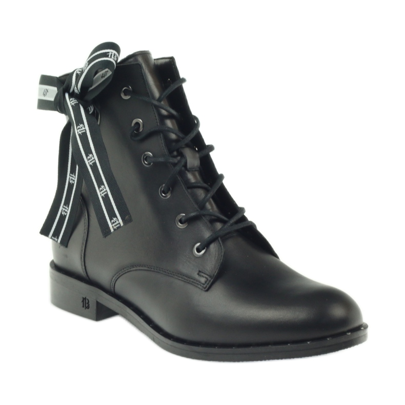 Boots decorated with a bow and Badura studs black 1