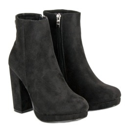 Small Swan Classic boots on the post black 1